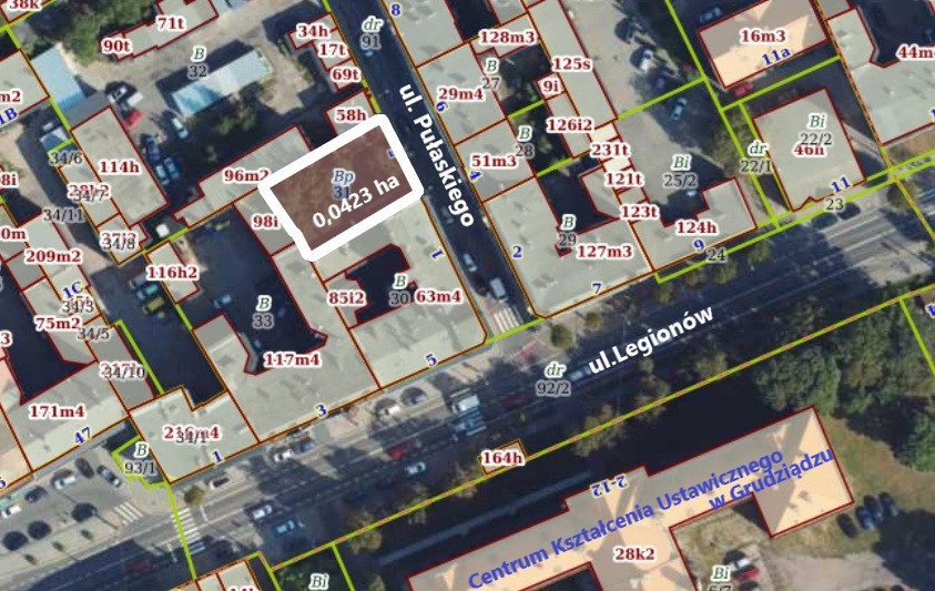 Grafika przedstawia miejską działkę na sprzedaż.
